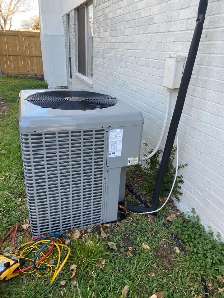 An outdoor AC unit in Irving